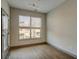 Bright bedroom with hardwood floors, large window, and neutral paint at 238 Walker Sw St # 32, Atlanta, GA 30313