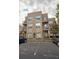 Modern condo building featuring balconies and reserved parking spaces for residents at 238 Walker Sw St # 32, Atlanta, GA 30313