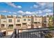 Exterior view of townhomes with garages and balconies, showcasing modern design and community living at 238 Walker Sw St # 32, Atlanta, GA 30313