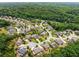 Aerial view of homes in a suburban community with mature trees at 4371 Wigley Preserve Dr, Marietta, GA 30066