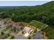 Aerial view of home in a wooded neighborhood, showing property lines at 4371 Wigley Preserve Dr, Marietta, GA 30066