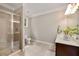 Bathroom featuring glass-enclosed shower and double sink vanity at 4371 Wigley Preserve Dr, Marietta, GA 30066
