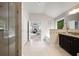 Bright bathroom with a glass shower, soaking tub, and double vanity at 4371 Wigley Preserve Dr, Marietta, GA 30066
