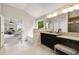 Bright bathroom featuring a double vanity, soaking tub, and view to bedroom at 4371 Wigley Preserve Dr, Marietta, GA 30066