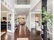 Elegant foyer with hardwood floors, high ceilings, and an open view into the living spaces at 4371 Wigley Preserve Dr, Marietta, GA 30066