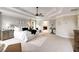 Spacious main bedroom with tray ceilings, neutral tones and large windows at 4371 Wigley Preserve Dr, Marietta, GA 30066