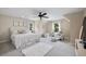 A bright main bedroom with a seating area and modern decor at 4371 Wigley Preserve Dr, Marietta, GA 30066