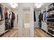 Custom walk-in closet design with shelving and drawers for optimal organization at 4371 Wigley Preserve Dr, Marietta, GA 30066