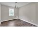 Cozy dining area with chandelier and a large window offering natural light at 8989 Teal Ln, Jonesboro, GA 30236
