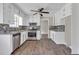 This kitchen boasts stainless steel appliances, sleek counters and ample cabinet space at 8989 Teal Ln, Jonesboro, GA 30236