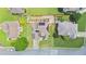 Aerial view of a home with solar panels, spacious backyard, and well-maintained landscaping at 3735 Turnbury Oaks Dr, Peachtree Corners, GA 30096