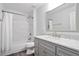 Clean, renovated bathroom with marble-tiled shower and gray vanity at 3735 Turnbury Oaks Dr, Peachtree Corners, GA 30096