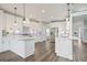 Bright kitchen with stainless steel appliances, sleek countertops, and gray backsplash at 3735 Turnbury Oaks Dr, Peachtree Corners, GA 30096