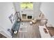 Open concept living room, fireplace, and bright light at 3735 Turnbury Oaks Dr, Peachtree Corners, GA 30096