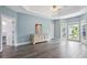 Spacious main bedroom with tray ceilings and multiple windows for natural light at 3735 Turnbury Oaks Dr, Peachtree Corners, GA 30096