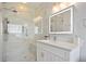 Modern bathroom with glass enclosed shower and marble tile at 3735 Turnbury Oaks Dr, Peachtree Corners, GA 30096