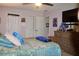 Bedroom featuring a ceiling fan, a chest of drawers, and a plush bed at 150 Ashley Dr, Fayetteville, GA 30214