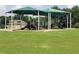 Community playground with covered play structures and slides, perfect for outdoor recreation at 150 Ashley Dr, Fayetteville, GA 30214
