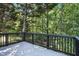 Outdoor deck overlooking an expansive wooded backyard at 4076 Whistler Dr, Douglasville, GA 30135
