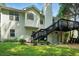 Rear exterior of a home with wood siding and a deck overlooking the yard at 4076 Whistler Dr, Douglasville, GA 30135