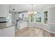 Bright kitchen nook with granite countertops, stainless steel sink and large windows at 4076 Whistler Dr, Douglasville, GA 30135
