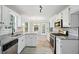 Modern kitchen featuring stainless steel appliances, granite countertops, and bright white cabinetry at 4076 Whistler Dr, Douglasville, GA 30135