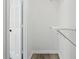 Walk-in closet features wood-look laminate flooring and a shelf at 4076 Whistler Dr, Douglasville, GA 30135