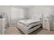 Clean bedroom featuring carpet, white walls, and simple decor at 108 Berwick Crossing, Dallas, GA 30157