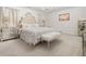 Luxurious bedroom featuring plush carpeting, a chandelier, and sophisticated furnishings at 108 Berwick Crossing, Dallas, GA 30157