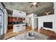 Bright living room with hardwood floors and an open concept to the kitchen at 44 Peachtree Nw Pl # 1828, Atlanta, GA 30309