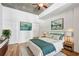 Serene bedroom with a plush bed, decorative pillows, and natural light at 44 Peachtree Nw Pl # 1828, Atlanta, GA 30309