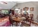 Elegant dining room with wood table, stylish accents, and plenty of natural light at 490 Hunters Glen Ct, Lawrenceville, GA 30044
