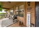 Inviting front porch with seating and decor, offering a cozy and welcoming entrance to the home at 490 Hunters Glen Ct, Lawrenceville, GA 30044