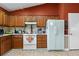 Efficient kitchen area with essential appliances and abundant cabinet space at 490 Hunters Glen Ct, Lawrenceville, GA 30044