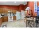 Functional kitchen area with essential appliances and adjoining kitchenette at 490 Hunters Glen Ct, Lawrenceville, GA 30044