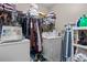 Functional laundry room with washer, dryer, shelving and plenty of space at 490 Hunters Glen Ct, Lawrenceville, GA 30044