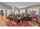 Comfortable living room with a large sofa, plush cushions, and lots of natural light at 490 Hunters Glen Ct, Lawrenceville, GA 30044
