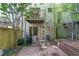 Outdoor space with a patio, spiral staircases, and natural landscaping, perfect for outdoor living at 1346 Peter Haughton Nw Way # 2, Atlanta, GA 30318