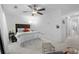 Comfortable bedroom with a ceiling fan, soft lighting, and a tranquil ambiance for restful nights at 1346 Peter Haughton Nw Way # 2, Atlanta, GA 30318