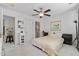Cozy bedroom featuring a ceiling fan, comfortable bed, and neutral tones for a tranquil retreat at 1346 Peter Haughton Nw Way # 2, Atlanta, GA 30318