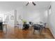 Bright dining room featuring hardwood floors, contemporary furnishings, and ample natural light at 1346 Peter Haughton Nw Way # 2, Atlanta, GA 30318