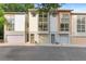 Contemporary townhome exterior featuring a private garage and modern architectural details at 1346 Peter Haughton Nw Way # 2, Atlanta, GA 30318