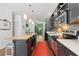 Contemporary kitchen with an island, pendant lighting, stainless steel appliances, and an open layout at 1346 Peter Haughton Nw Way # 2, Atlanta, GA 30318