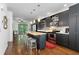 Modern kitchen featuring stainless steel appliances, stylish cabinets, and a central island at 1346 Peter Haughton Nw Way # 2, Atlanta, GA 30318