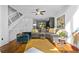 Open-concept living room featuring stylish decor, comfortable seating, and abundant natural light at 1346 Peter Haughton Nw Way # 2, Atlanta, GA 30318