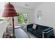 Bright home office area featuring a comfortable sofa and ample natural light at 1346 Peter Haughton Nw Way # 2, Atlanta, GA 30318
