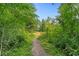 Gravel path surrounded by lush greenery, inviting residents to explore the natural beauty at 1346 Peter Haughton Nw Way # 2, Atlanta, GA 30318
