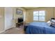 Comfortable bedroom featuring plush carpet, natural light, and a flat screen television at 2107 Se Gorman Se Grv # 132, Atlanta, GA 30316