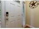 Welcoming entryway featuring a secure white door, and a decorative welcome sign at 2107 Se Gorman Se Grv # 132, Atlanta, GA 30316