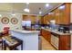 Well-equipped kitchen with stainless steel appliances, wooden cabinets, and granite countertops at 2107 Se Gorman Se Grv # 132, Atlanta, GA 30316